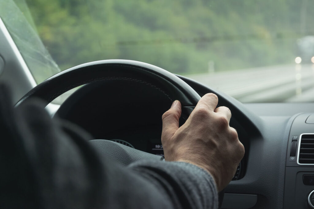 Image of a man driving a car. You don't have to learn how to set boundaries on your own. An experience relationship therapist in Delray Beach, FL, can show you how to move forward with self-compassion. 