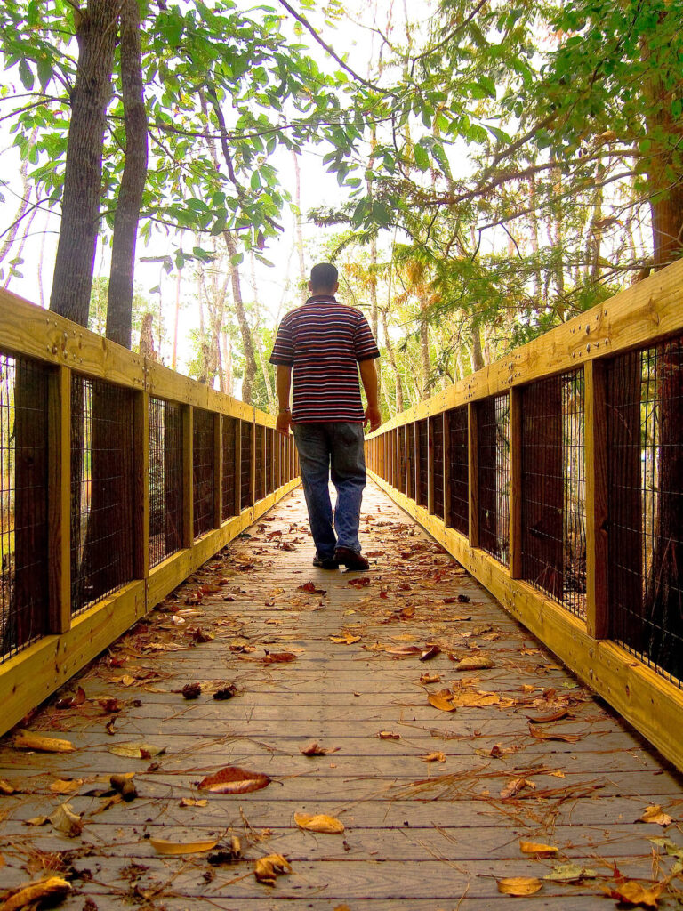 Photo of a man away on a bridge. If a toxic friend won't change their behavior, it might be time to walk away. An experienced relationship therapist in Delray Beach, FL, can help you set healthy boundaries. 