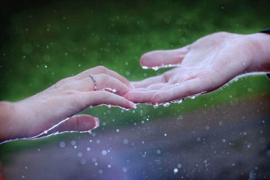 Photo of a couple touching each other's hands in the rain. Does your partner's behavior feel harmful? Relationship counseling in Delray Beach, FL, can help you recognize and deal with toxic relationship patterns. 
