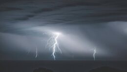 Picture of a lightning storm looming over an ocean. Anxiety can make all of the relationships in your life feel tumultuous. Learn how to weather the storm of anxiety during relationship therapy in Delray Beach, FL.