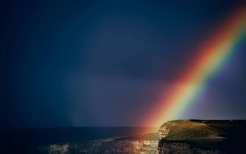 Photo of a rainbow over an ocean. If anxiety is affecting your relationships, there is hope after the storm. Work with a relationship therapist in Delray Beach, FL, to manage anxiety and protect your important bonds.