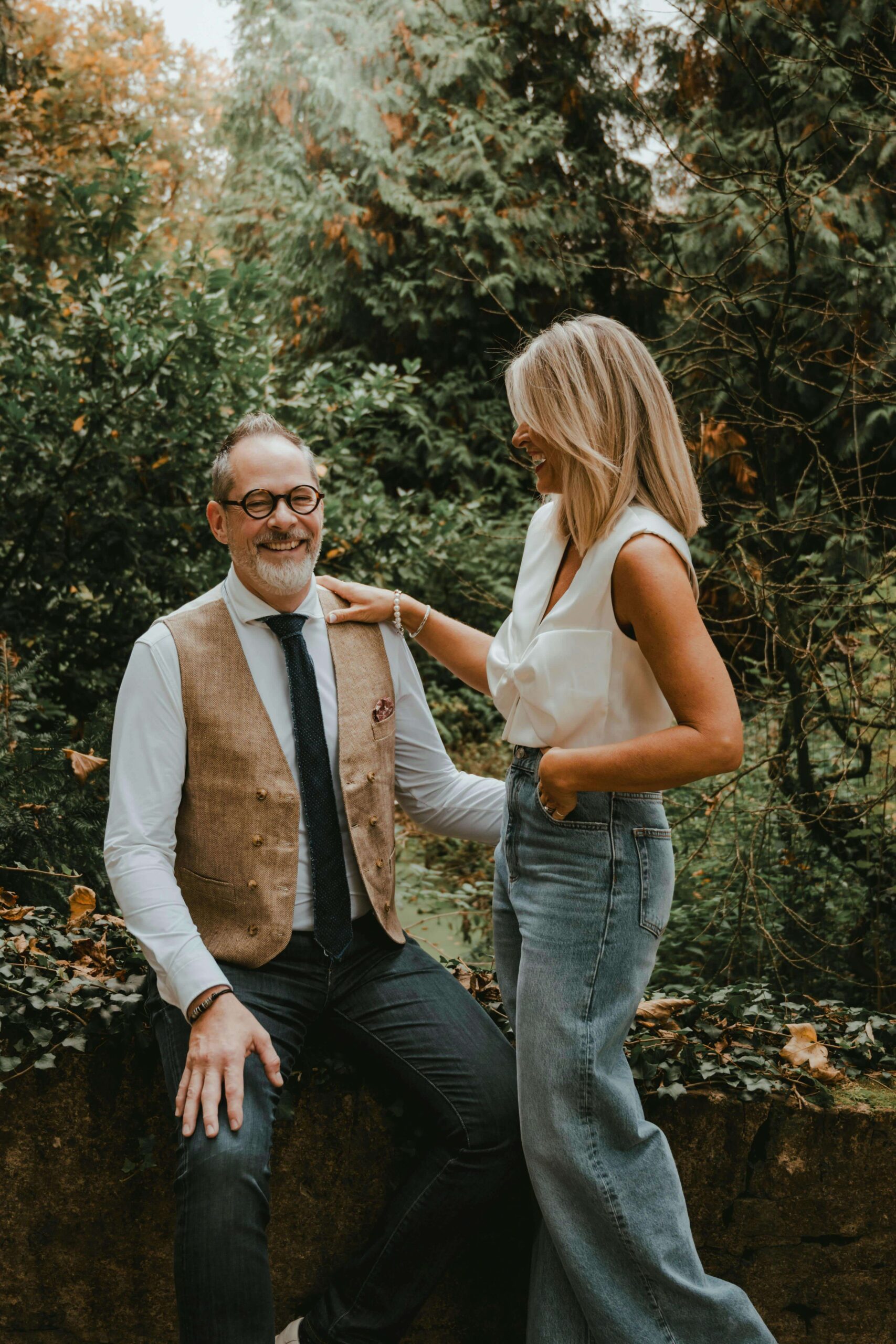 A smiling couple shares a lighthearted moment in a garden. A happy marriage thrives on communication, laughter, and connection. Relationship counseling in Delray Beach, FL, can strengthen these habits to support love and trust.