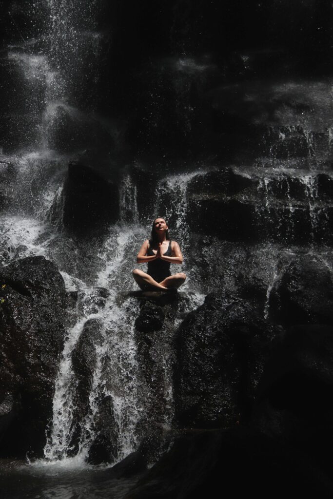 Waterfall yoga | am i the problem in my relationship delray beach | relationship love fading | relationship therapist | Delray Beach | Juno Beach | Loxahatchee A woman meditates beneath a waterfall, reflecting in solitude. When relationship love is fading, self-awareness can be the first step toward healing. Relationship therapy in Delray Beach, FL, helps partners reconnect through self-reflection and growth.