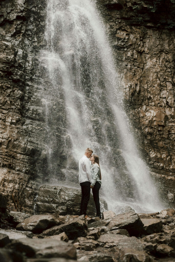 Waterfall couple | relationship therapist delray beach, fl | relationship love fading | marriage problems | Highland Beach | Palm Beach County | Boynton Beach A couple stands close together beneath a waterfall, holding hands. Marriage problems can weigh heavily, but compassion and therapy can renew closeness. A relationship therapist in Delray Beach, FL, helps couples rediscover emotional intimacy and trust.