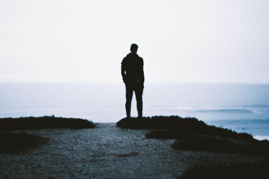 Man’s silhouette | anxiety therapy davis delray beach | anxiety counseling | anxiety solutions | Delray Beach, Florida | Highland Beach | Juno Beach | Loxahatchee | Atlantic Avenue | Palm Trails A solitary silhouette stands at the edge of land, gazing toward a quiet horizon. Do anxiety solutions feel distant amidst uncertainty? Anxiety therapy in Delray Beach, FL, can help clarify what’s happening internally and support meaningful change.