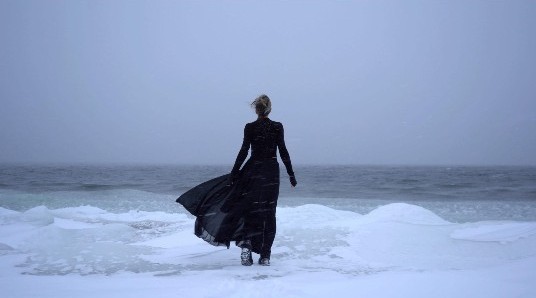 A woman walks toward a frozen shoreline. When emotions are pushed down instead of felt, it sometimes causes anxiety. Working with an anxiety therapist in Delray Beach, FL can help untangle what’s been held inside.
