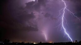 Lightning striking ground in front of a purple sunset. Are panic attacks making you feel on edge? An anxiety therapist in Delray Beach, FL, can help you identify your triggers and develop a plan to overcome panic and anxiety.