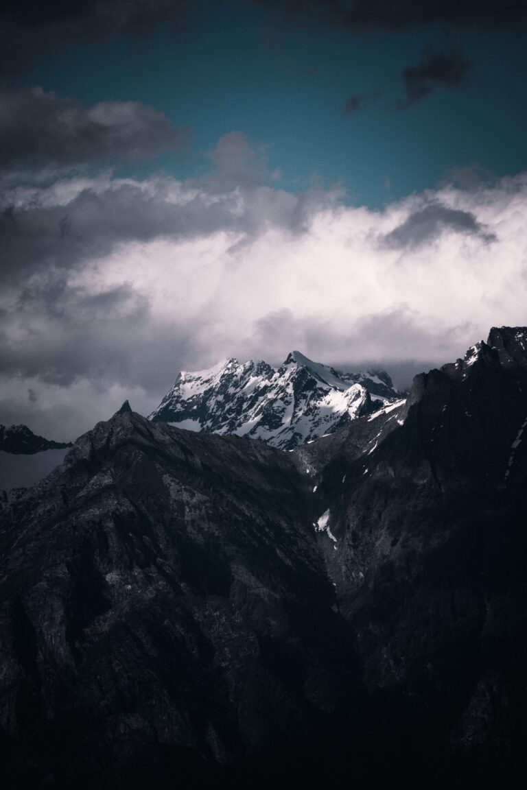 Dark, snow-covered mountain peaks rise beneath a heavy, cloudy sky. Does severe anxiety sometimes feel as overwhelming and unpredictable as a storm rolling in? An anxiety therapist in Delray Beach, FL can help you navigate these intense moments.