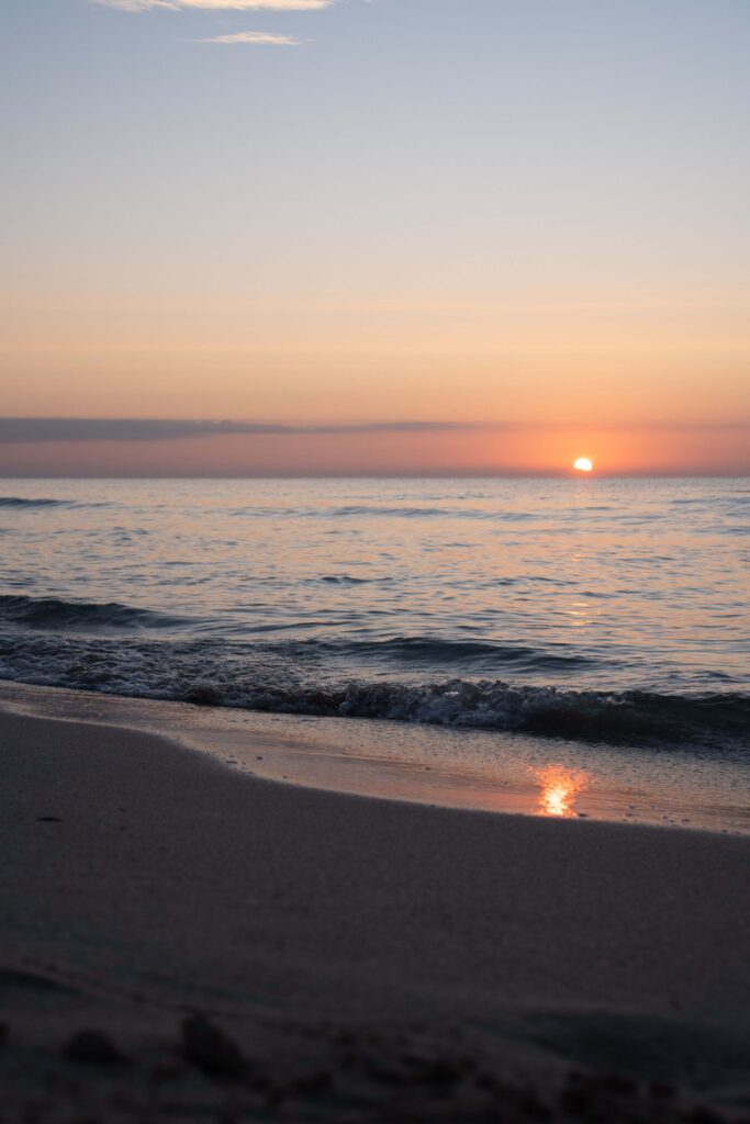 Ocean sunset | anxiety treatment delray beach | anxiety vs stress | anxiety counseling | Delray Beach, Florida | Juno Beach | Loxahatchee | Pineapple Grove A glowing orange sunset stretches across the ocean as small waves reach the shore. Can chronic anxiety persist even during peaceful moments? Anxiety therapy in Delray Beach, FL, helps you recognize ongoing symptoms and manage excessive worry.